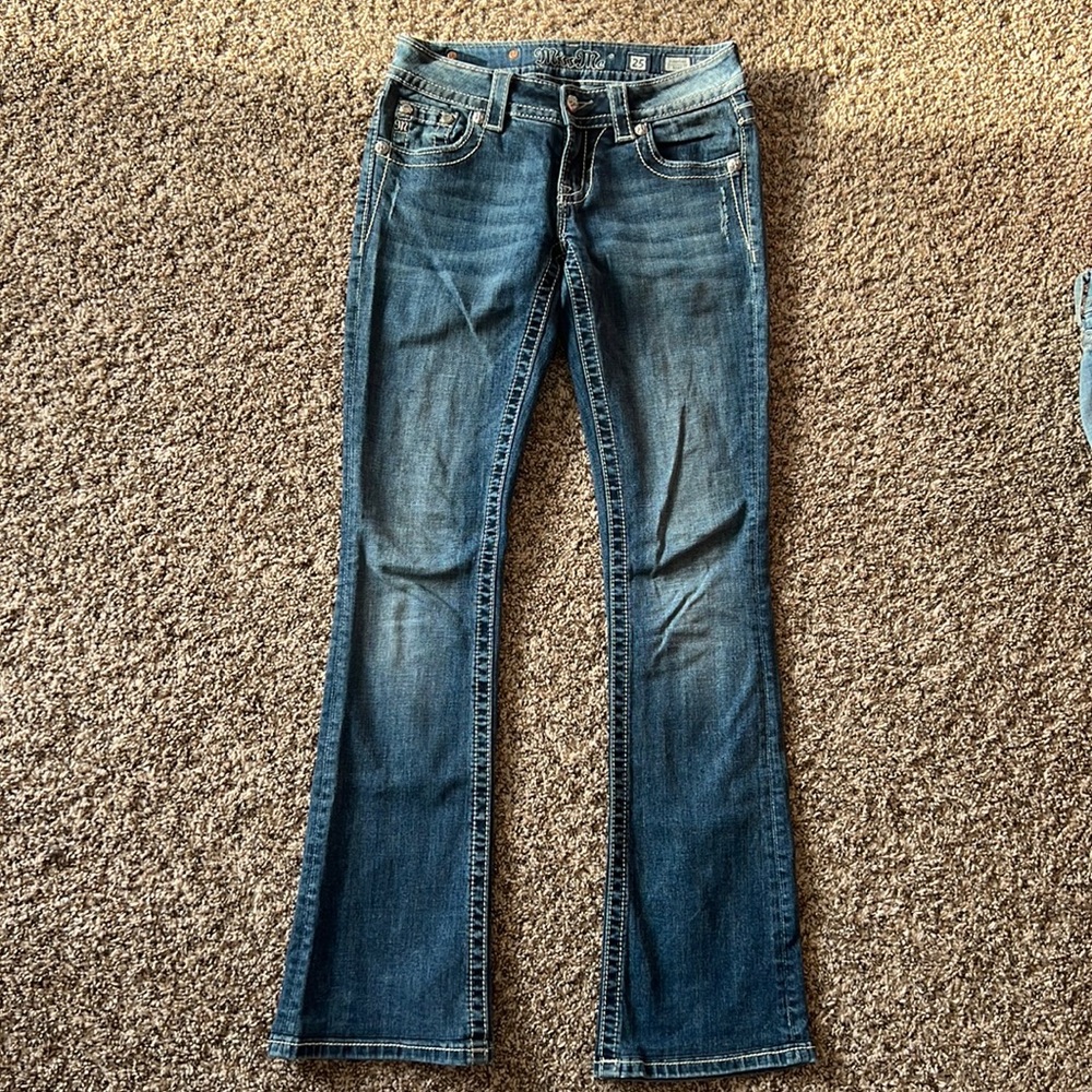 Miss Me boot cut jeans. Size 25. Hemmed inseam to 32”.
